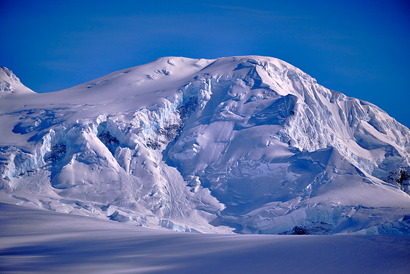 It was resurveyed and given its name in 1948 by the Falkland Islands Dependencies Survey.