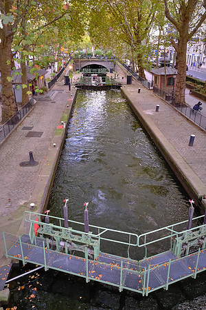 The Canal Saint-Martin is a 2.86 mi long canal connecting the Canal de l'Ourcq to the River Seine.