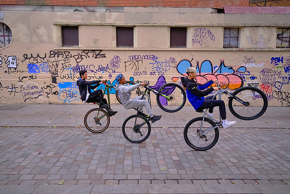 The bicycle boys of Canal Saint-Martin hotrod their rides along the canal.