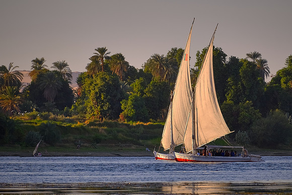 A dahabiya is a large sailboat with accommodation for up to 12 people and quite common on the Nile River.