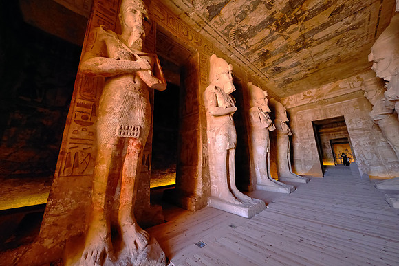 The statues bear the white crown of Upper Egypt, while those on the opposite side wear the double crown of Upper and Lower Egypt.