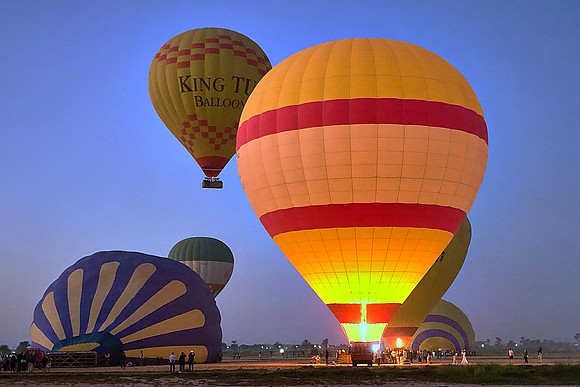 Early morning balloon ascension over the plains of Luxor.
