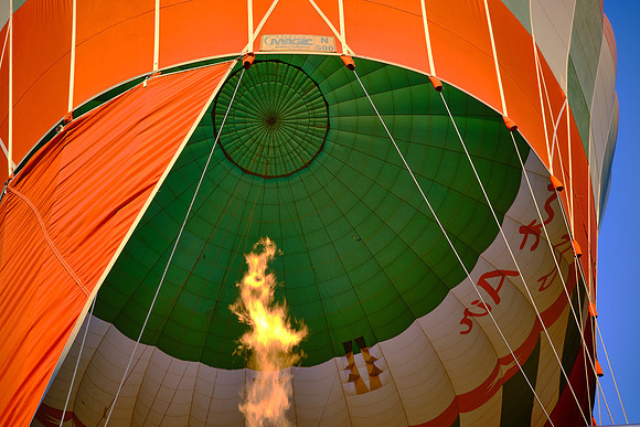 Early morning balloon ascension over the plains of Luxor.