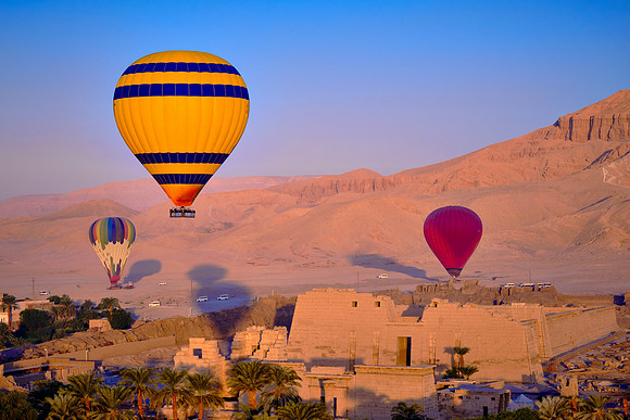 Early morning balloon ascension over the plains of Luxor.