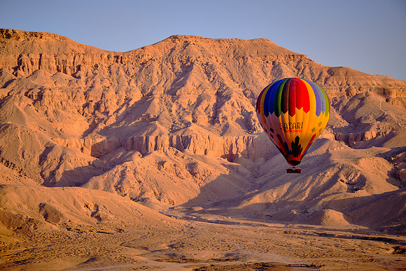 Early morning balloon ascension over the plains of Luxor.