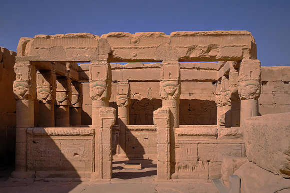 The stone steps ascend to the roof where there is a small chapel decorated with Hathor-headed columns.