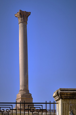 Pompey's Pillar is a Roman triumphal column to honor Diocletian (298–302 AD) and supported a statue of the emperor in armor.