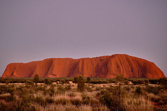 Uluru (aka Ayres Rock) is a massive sandstone monolith formed primarily from arkose sandstone.