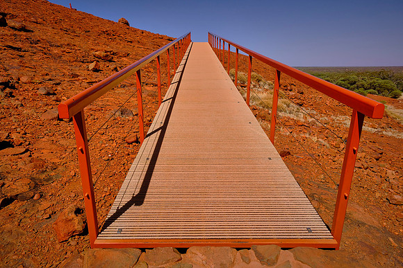 Kata Tjuta is conglomerate rock—rounded pebbles cemented in a sandy matrix—formed around 500 mya.