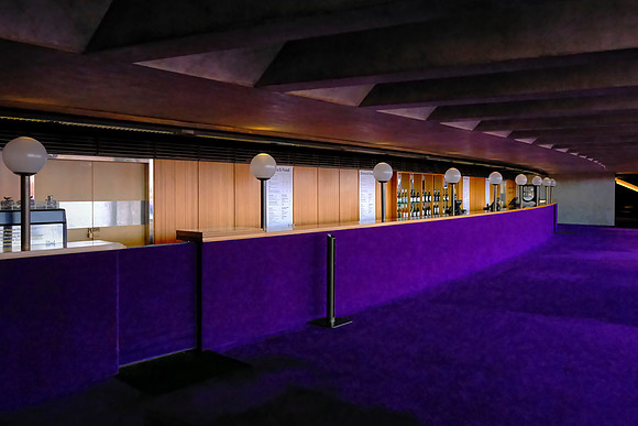 The interiors blend glass, wood, and plywood with advanced acoustics.