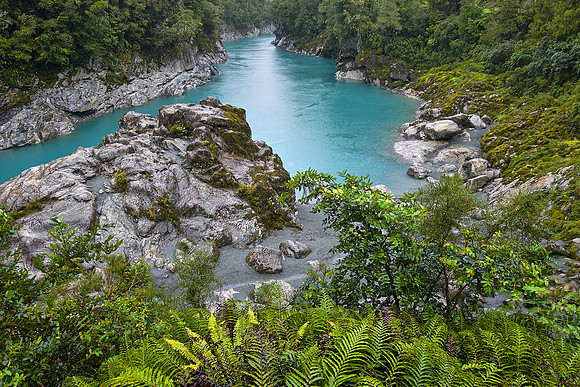 The Hokitika Gorge Scenic Reserve is within the rugged rainforest‑belt of the Southern Alps.