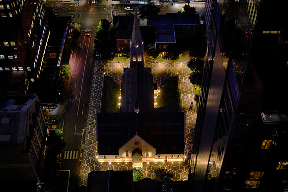 St. Patrick's Cathedral (1884-1907) is Gothic Revival architecture with a tall spire, lancet windows, and buttresses.