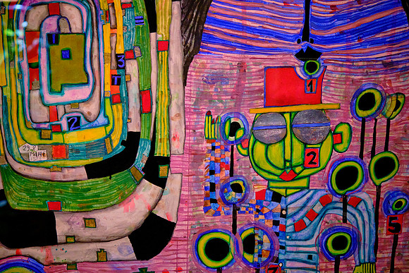 Typical elements of Hundertwasser’s architecture include undulating (uneven) floors and irregular windows.