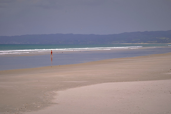 The beach is known for its relaxed, back‑to‑basics feel and no cafes or surf clubs on the beach itself.