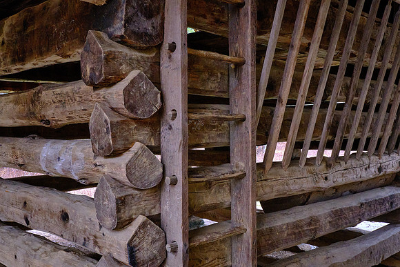 This type of barn, common in the 1800s, allowed a wagon to pull through and unload hay or feed for the livestock
