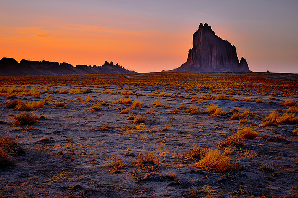 Shiprock looking north at sunset.  The rock was formed 3,000 feet below the Earth's surface and exposed after millions of years of erosion.