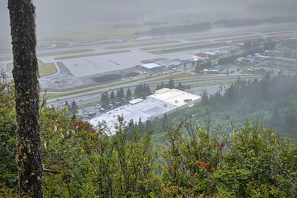 The Juneau International airport can be seen from atop the rainforest.