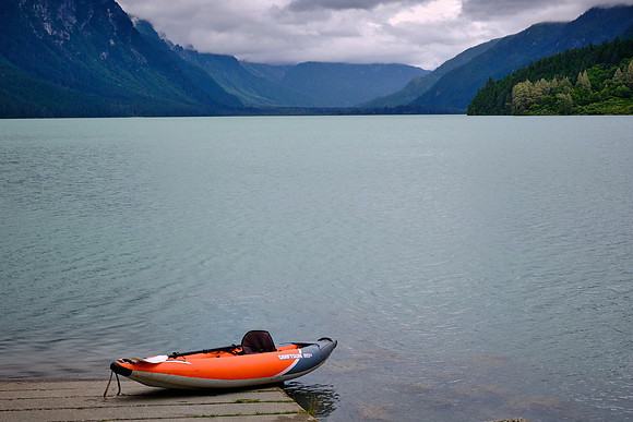 Chilkoot Lake is surrounded by forested Coast Mountain slopes and remnants of the region’s glacial landscape.
