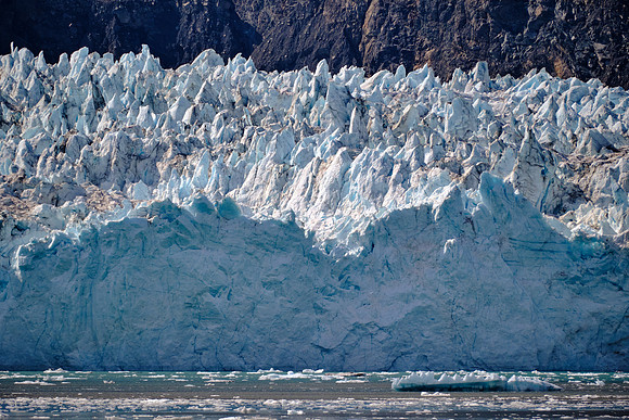 The Margerie tidewater glacier is highly active, frequently "calving" massive icebergs into the ocean.