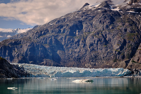 The ice itself flows downhill toward the ocean at a rate of 3 to 7 feet per day (about 2,000 feet per year).