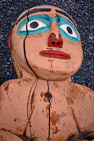 Weathered and rotten totem poles await duplication and recommissioning.