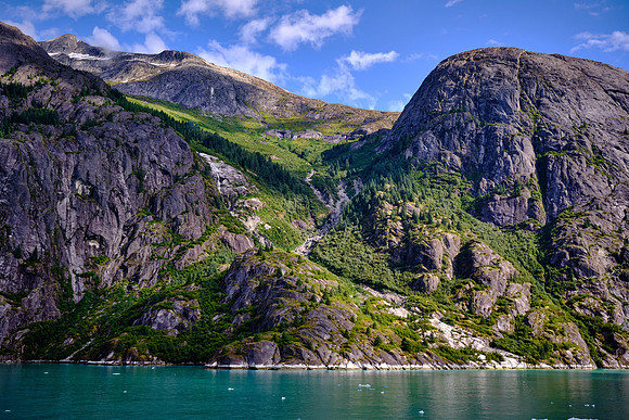 Ice sheets each 2 miles thick have scoured the fjord 4 different occasions during the last 2 million years.