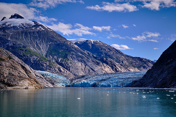 First, there is snow and ice accumulation resulting in glacial advance for thousands of years.