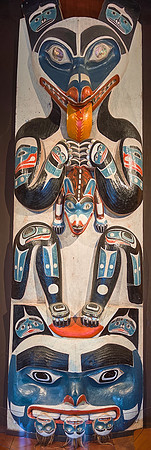 Because the original outdoor wood weathered over the decades, poles were replicated by local native artists.