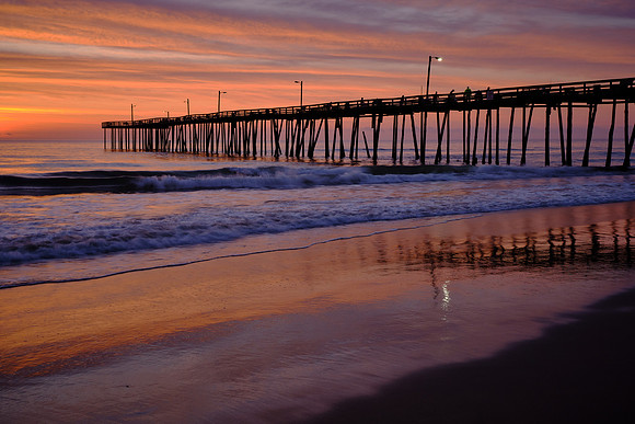 Sunrise over the Atlantic Ocean and Nags Head Fishing Pier, NC