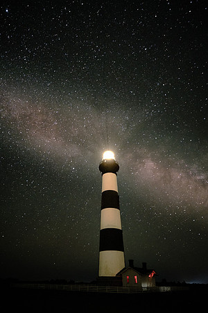 The Milky Way over Bodie Island Light Station. The star light in this image left the Milky Way core 27,000 years ago.