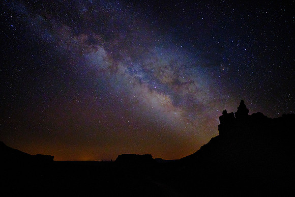 The Milky Way over the Valley of the Gods, UT.  The rock formations are sculpted from Cedar Mesa sandstone of the Permian Period, around 250 million years ago.