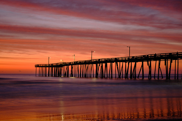 Sunrise over the Atlantic Ocean and Nags Head Fishing Pier, NC