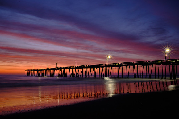 Sunrise over the Atlantic Ocean and Nags Head Fishing Pier, NC