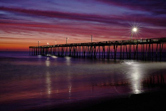 Sunrise over the Atlantic Ocean and Nags Head Fishing Pier, NC