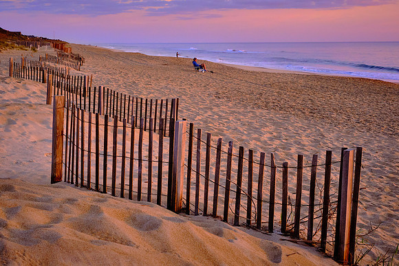 On the beach at sunrise at Nags Head Fishing Pier, NC