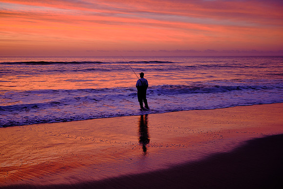 Sunrise over the Atlantic Ocean and Nags Head Fishing Pier, NC