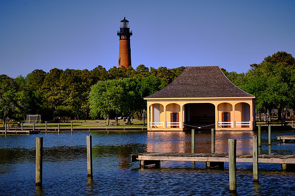 The boathouse at the Whalehead Club and the Currituck Beach Lighthouse, Corolla, NC