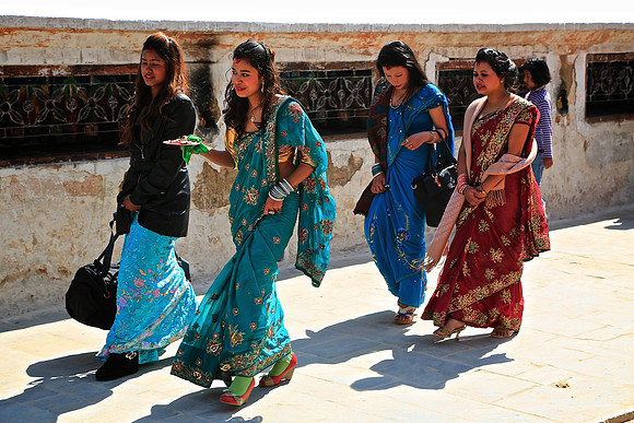 Pilgrims circle stupa three times, Boudhanath Stupa, Kathmandu, Nepal