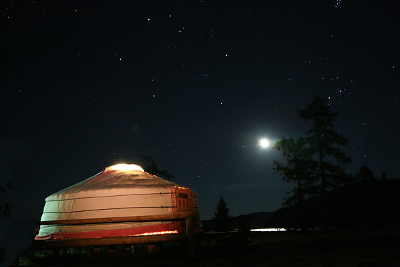 My ger in the moonlight and lake reflection