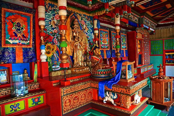 Throughout Mongolia, Buddhist traditional ceremonial scarves, known as khadag, hang inside the temples. The color blue symbolizes the sky and dates  to the ancient Mongol shamanic worship.