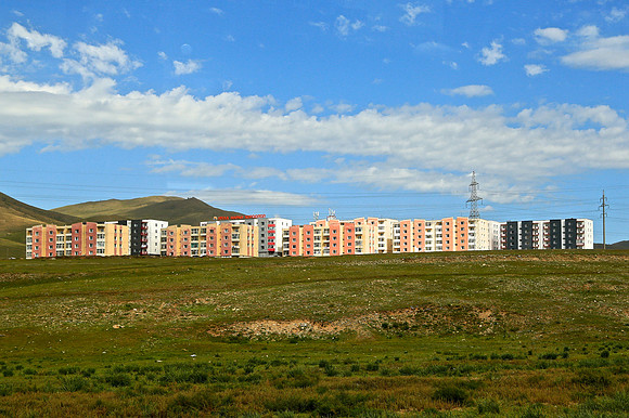 Apartment construction is ubiquitous. Road east of Ulaanbaatar to Gorkhi-Terelj National Park
