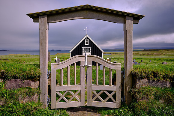The iconic black chuch overlooks the Bjerdha Fjord in northwest Iceland.