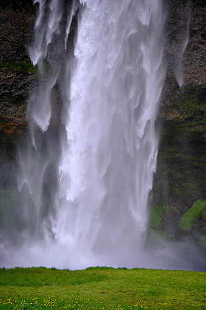 The Seljalandsfoss waterfall is one that visitors can pass behind — and get very wet.