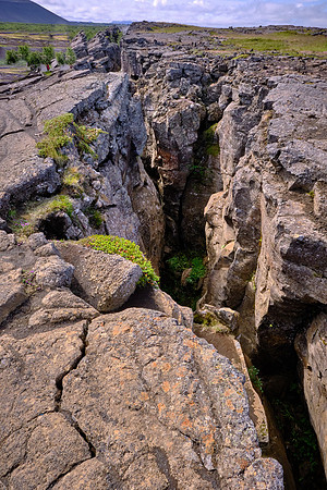 Grjótagjá is a small lava cave near Lake Mývatn with a thermal spring inside.