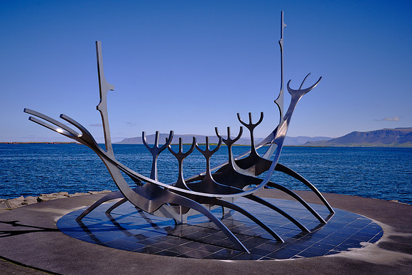 The Sun Voyager gracefully faces north across Faxaflói Bay.