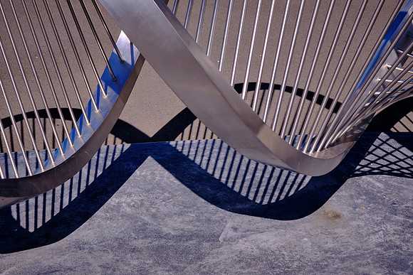 An Aeolian harp, the sculpture produces sonic tones as the wind travels through it.
