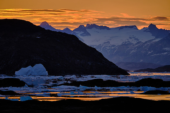 2023 July 10.  Sunset (11:11 PM) over Kulusuk looking north (340.8 degrees), Greenland.