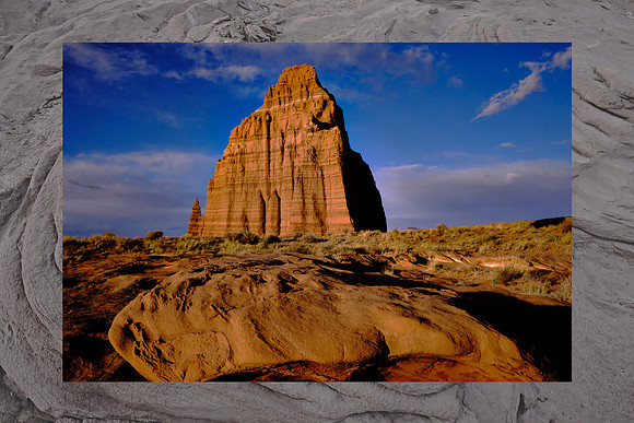 The environment is composed of the earthy, buff-pink Entrada Sandstone. Deposited 160 million years ago, this fine-grained sandstone formed by the deposition of sand and silt in tidal flats.