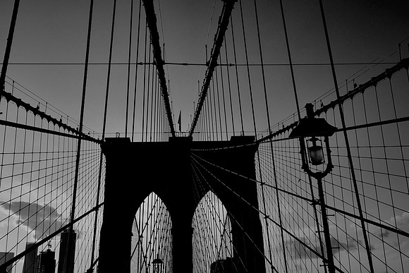 Across the Brooklyn Bridge and the East River at sunset, New York City