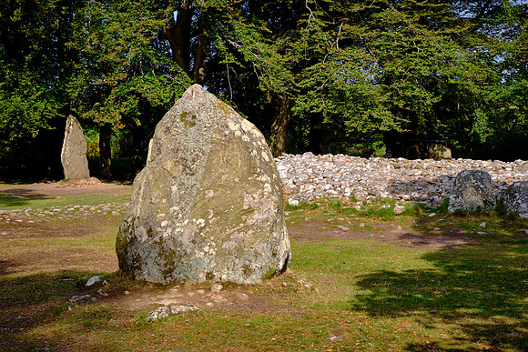 A stone circle surrounds the whole tomb and a kerb often runs around the cairn.